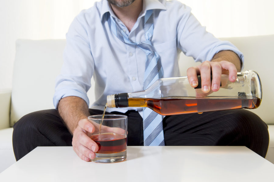 Image of businessman needing alcohol use assessment