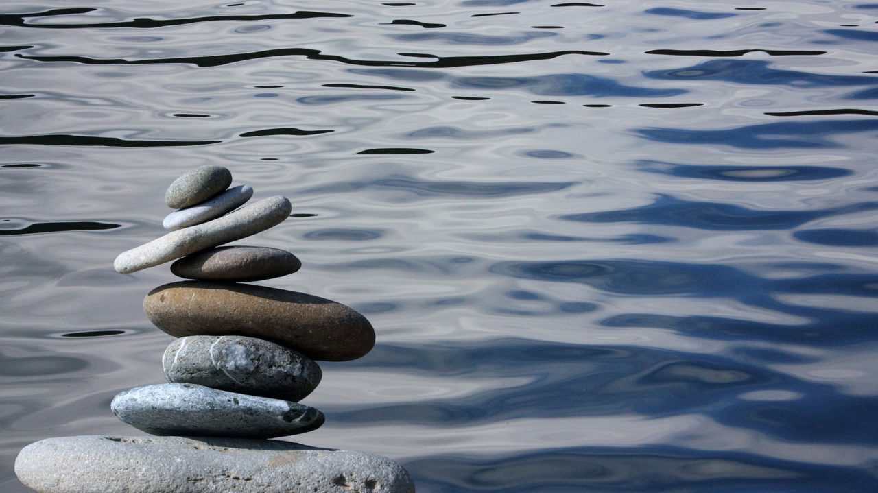 Image of stones balancing to indicate managing anxiety
